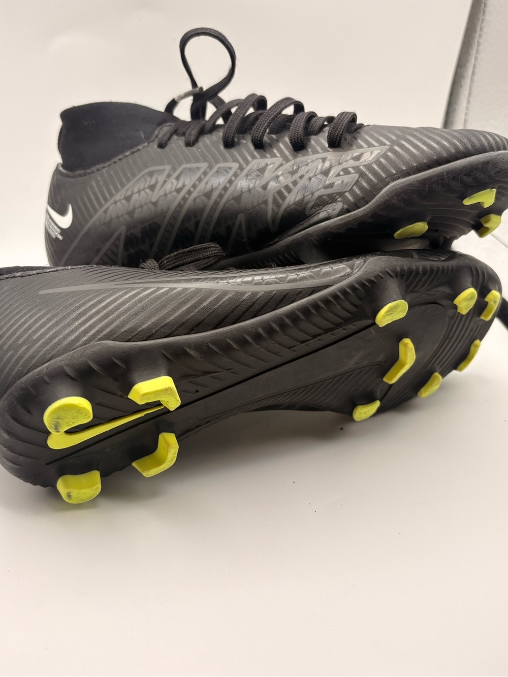 Nike Black Youth Soccer Cleats with Neon Yellow Studs